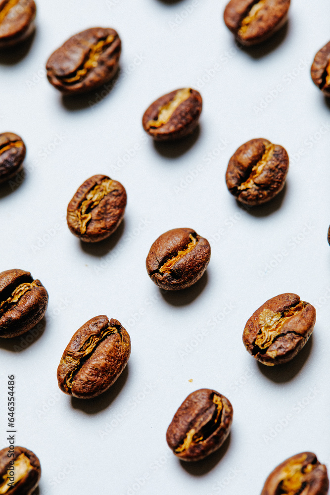 Coffee beans on white background - stock photo Coffee beans on white background - stock photo