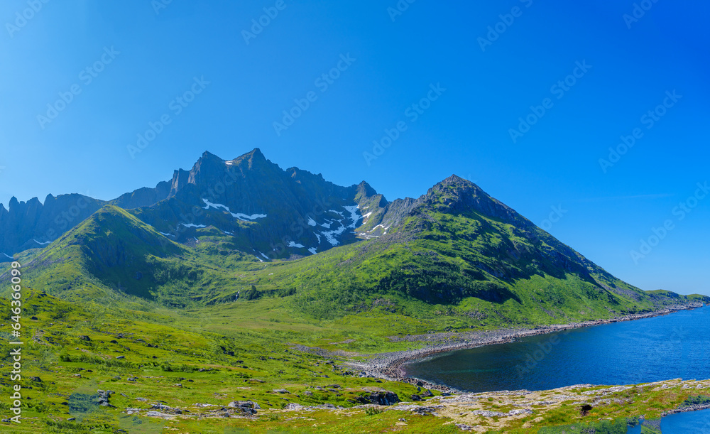 Amazing nature view with fjord and mountains. Beautiful summer Norway landscape. Artistic picture. Beauty world. The feeling of complete freedom Amazing nature view with fjord and mountains. Beautiful summer Norway landscape. Artistic picture. Beauty world. The feeling of complete freedom