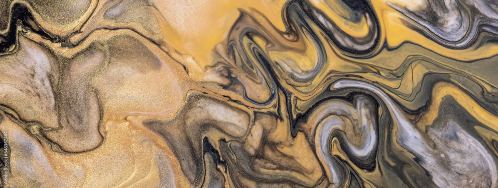Abstract fluid art background black and golden colors. Liquid acrylic painting on canvas with yellow gradient