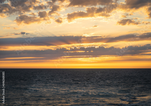 Beautiful sunset from the Whales Lighthouse (Phare des Baleines) on Île de Ré in France © SylviePM