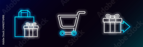Set line Gift box, and Shopping cart icon. Glowing neon. Vector