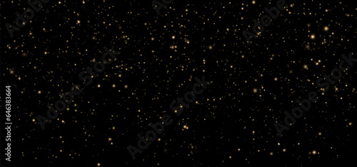 Festive vector background with gold glitter and confetti for Christmas celebration. Black background with glowing golden particles.