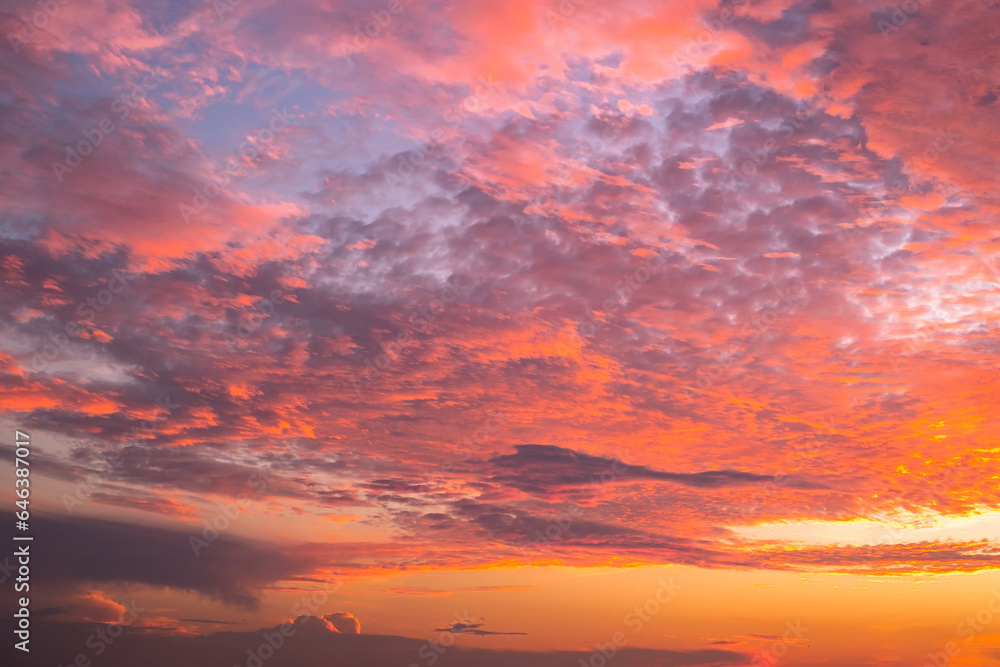 Fototapeta premium Beautiful , luxury soft gradient orange gold clouds and sunlight on the blue sky perfect for the background, take in everning,Twilight, Large size, high definition landscape photo
