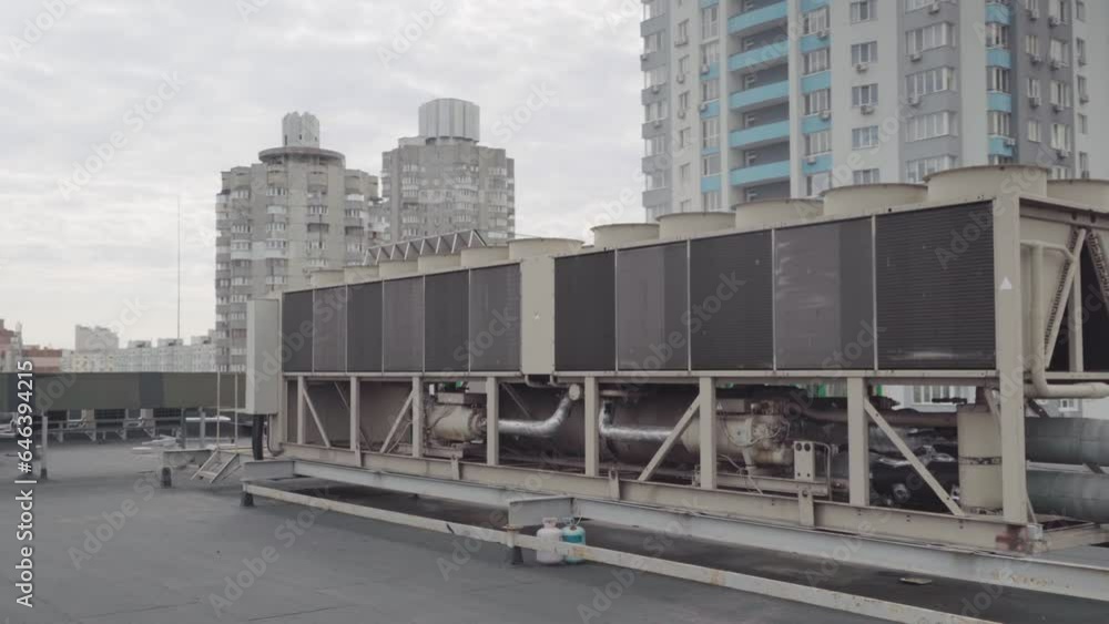 Heating and cooling air conditioner unit on roof. Gimbal stabilizer shot Heating and cooling air conditioner unit on roof. Gimbal stabilizer shot