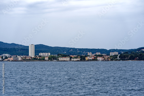 Bay of Mediterranean Sea with skyline of French City of Toulon on a cloudy late spring day. Photo taken June 9th, 2023, Toulon, France. © Michael Derrer Fuchs