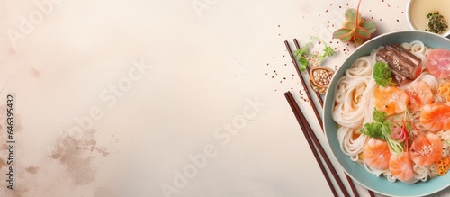 Cold Chinese noodles with meat and veggies in Japanese cuisine isolated pastel background Copy space