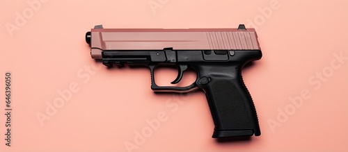 Air gun Replica of a genuine handgun on isolated pastel background Copy space photo