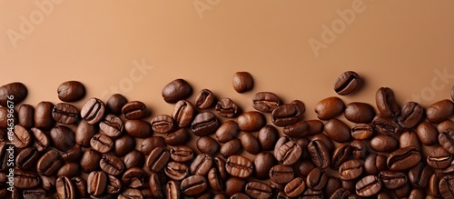 Coffee beans roasted and displayed against a isolated pastel background Copy space