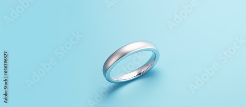 Blue ring with silver isolated on a isolated pastel background Copy space