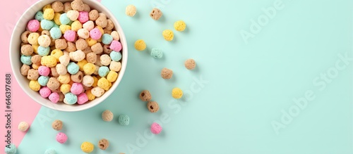 Cereal balls with milk photographed on a isolated pastel background Copy space