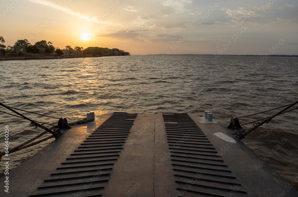 Watching the beautiful sunset on board a ferry on the Amazon river to Manaus - Traveling Brazil, South America