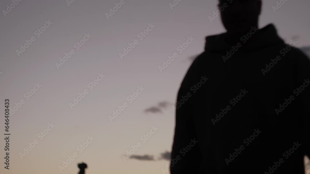 A man admires the sunset in Bardena Reales National Park A man admires the sunset in Bardena Reales National Park