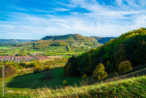 Germany, beautiful view above swabian alb nature landscape bissingen an der teck city houses sun day autumn colorful blue sky
