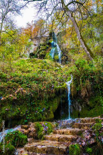 Obraz na płótnie Germany, Colors of autumn forest trees nature landscape bad urach waterfall destination on swabian alb nature reserve w salonie
