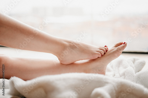 Hyperrealistic Feet Resting on a Comfortable Bed