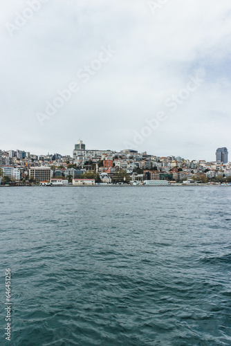 View of bosphorus strait water at mid day with beautiful light and bridge with skyline © Radu