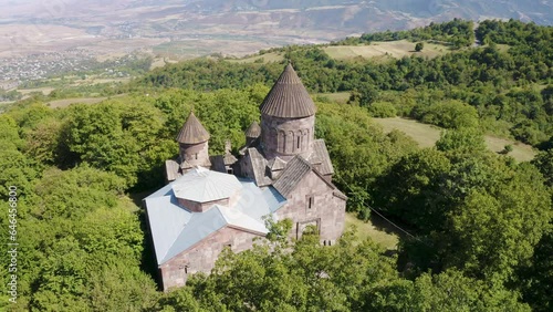 Panoramic drone footage of Makaravank Monastery on sunny summer day. Achajur, Tavush Province, Armenia. photo