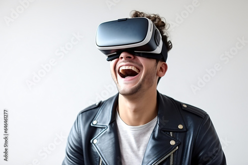 A young man is immersed in a virtual reality experience  wearing a VR headset and interacting with a digital world.