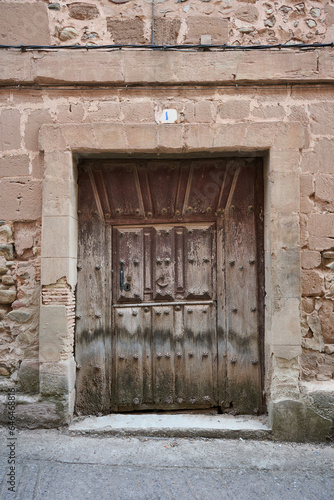 old wooden door at ancient village of Badaran, La Rioja, Spain
