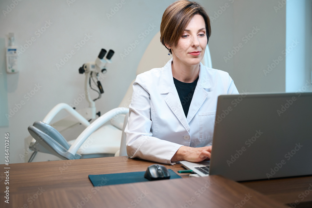Doctor at workplace in a gynecological office in medical center Doctor at workplace in a gynecological office in medical center