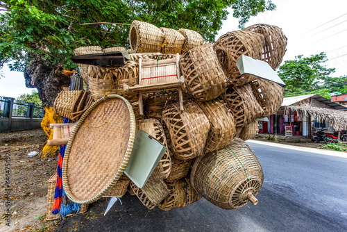 Tricycle packed with baskets for sale, Ilocos, Philippines, Asia photo