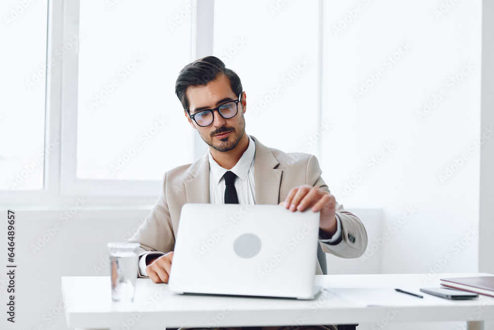 Success man corporate handsome technology winner business office job laptop businessman happy suit executive