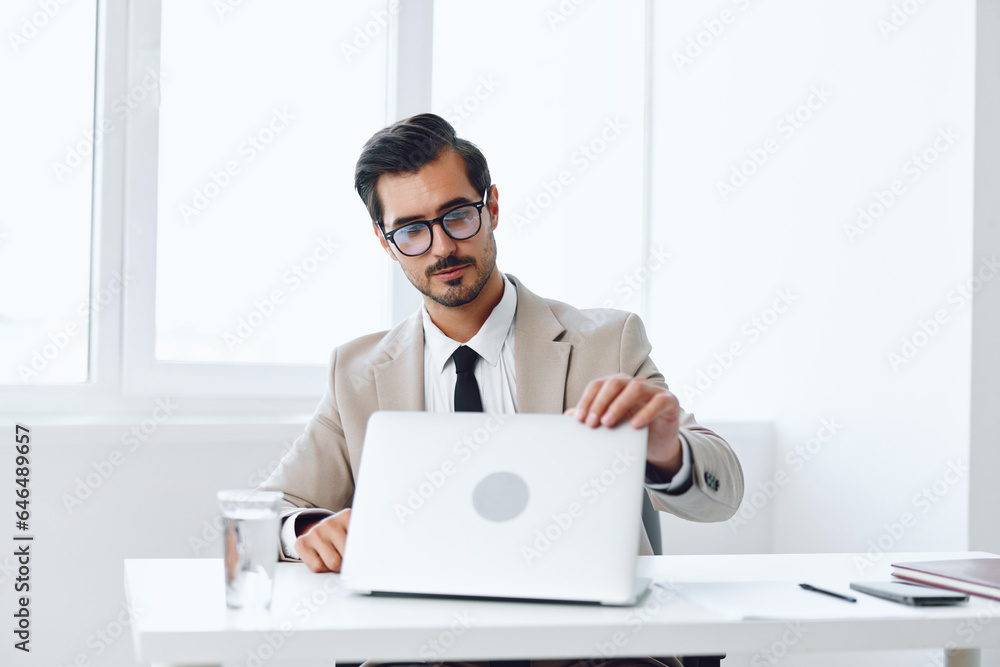 Success man corporate handsome technology winner business office job laptop businessman happy suit executive Success man corporate handsome technology winner business office job laptop businessman happy suit executive