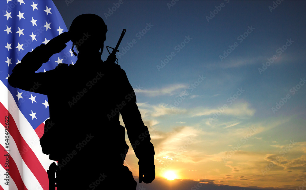 Silhouette of a soldier with USA flag against the sunset. Greeting card for Veterans Day, Memorial Day, Independence Day Silhouette of a soldier with USA flag against the sunset. Greeting card for Veterans Day, Memorial Day, Independence Day
