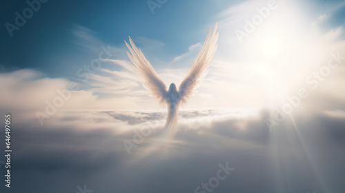 Angel flying in the sky above the clouds