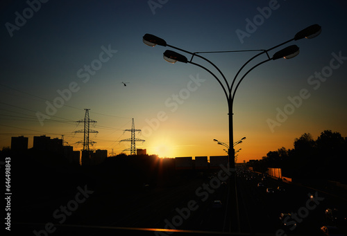Traffic highway lamp on sunset bridge background