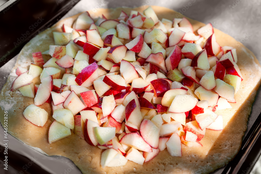 Sliced apples. Apple pieces. Red cut apple for pie. Selective focus Sliced apples. Apple pieces. Red cut apple for pie. Selective focus