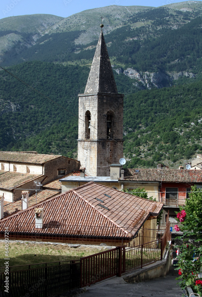 Obraz premium Enjoy a charming view of the bell tower of Santa Maria della Valle Church nestled within the small village of Scanno, Italy. This picturesque scene captures the essence of historical beauty