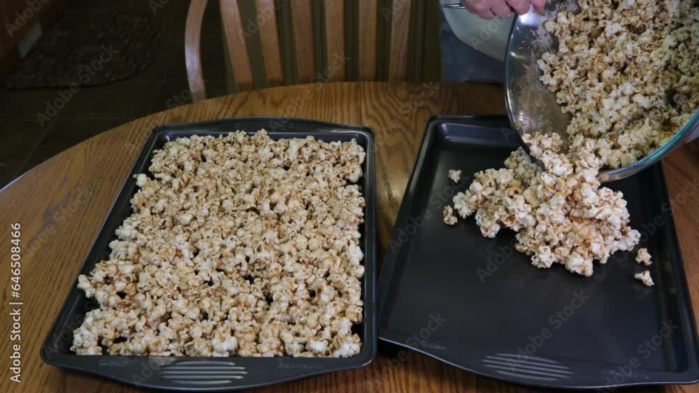 Cooking Popcorn popping on heated fry pan. Slow Motion. Making Popcorn Frying it in a Stove at