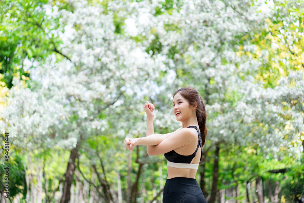 Young woman Finding Inner Peace in Yoga Pose at the Park. Yoga and Meditation Concept. Female exercising and stretching in Nature. Young woman Finding Inner Peace in Yoga Pose at the Park. Yoga and Meditation Concept. Female exercising and stretching in Nature.