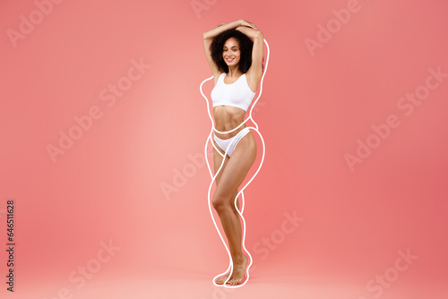 Attractive skinny black lady in white lingerie