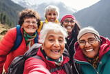 Group of senior women hiking with friends on the mountain, having fun together, taking selfie photo