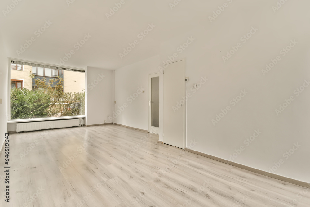 Empty unfurnished room with white walls and window Empty unfurnished room with white walls and window