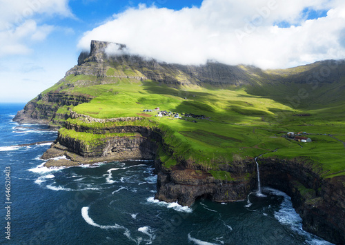 Leinwand Poster Faroe island landscape - waterfall from drone, Denmark