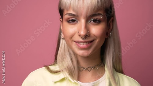 Informal female model with piercing on face photo