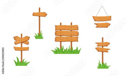 Wooden sign boards in the grass. Sign board on the stick, arrow signpost, showing direction. Old signboards for game. Blank banner hanging on chains. vector illustration