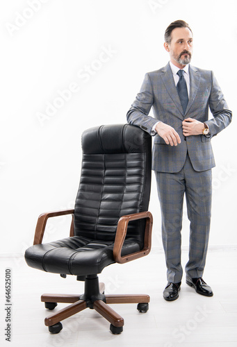 successful businessman man in boss office shows business success and leadership