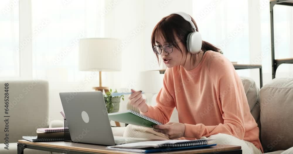 Video Call Lesson A dynamic caucasian teenage girl actively participates in a video call ...