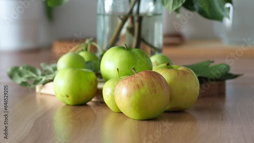 Wallpaper Mural apples on a wooden table. Fresh harvest of green garden apples on the table. Kitchen still life. Autumn mood to cook homemade cozy food. Apple Pie Time Torontodigital.ca