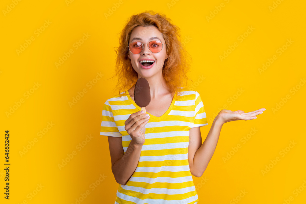 girl with icecream in studio, presenting product. girl with icecream on background. girl with icecream in studio, presenting product. girl with icecream on background.