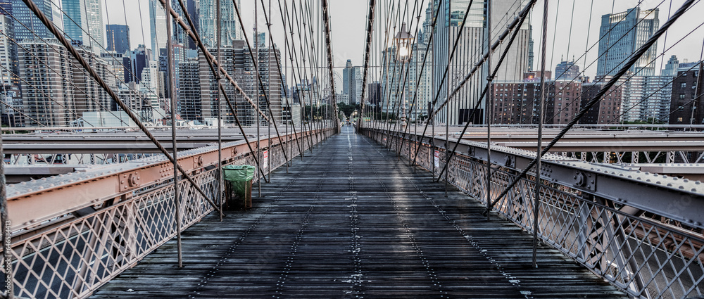 Obraz premium amazing scenery of brooklyn bridge over skyscrapers in metropolis. brooklyn bridge of new york city. Brooklyn bridge in ny, usa. brooklyn bridge in new york. Famous tourist spot