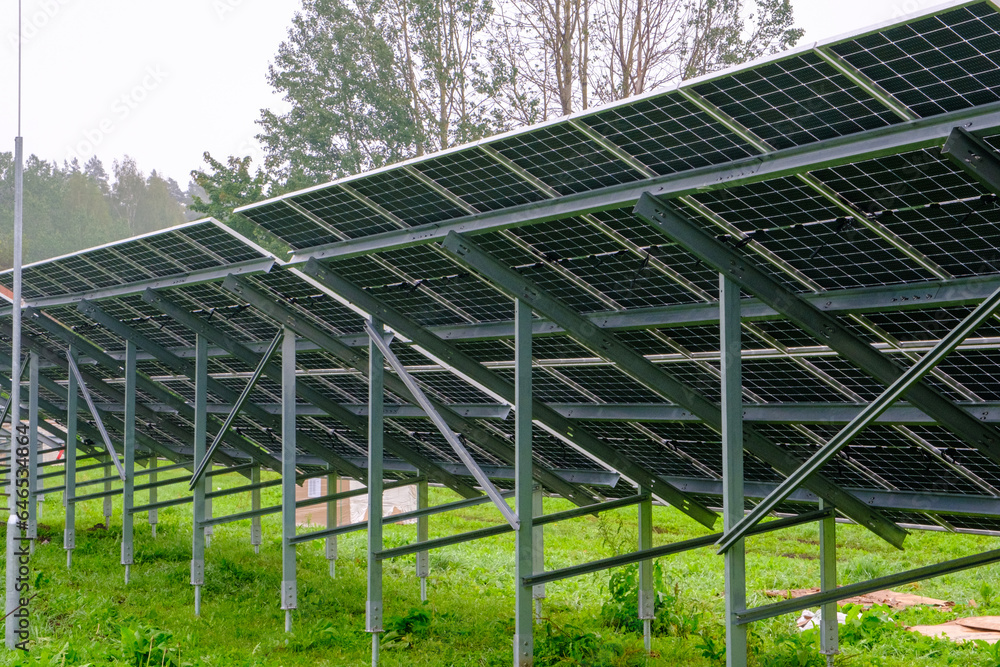 Solar panel with nano coating. Renewable energy from the sun, green energy, concept Generate energy. View of the panels from the other side. Metal constructions Solar panel with nano coating. Renewable energy from the sun, green energy, concept Generate energy. View of the panels from the other side. Metal constructions