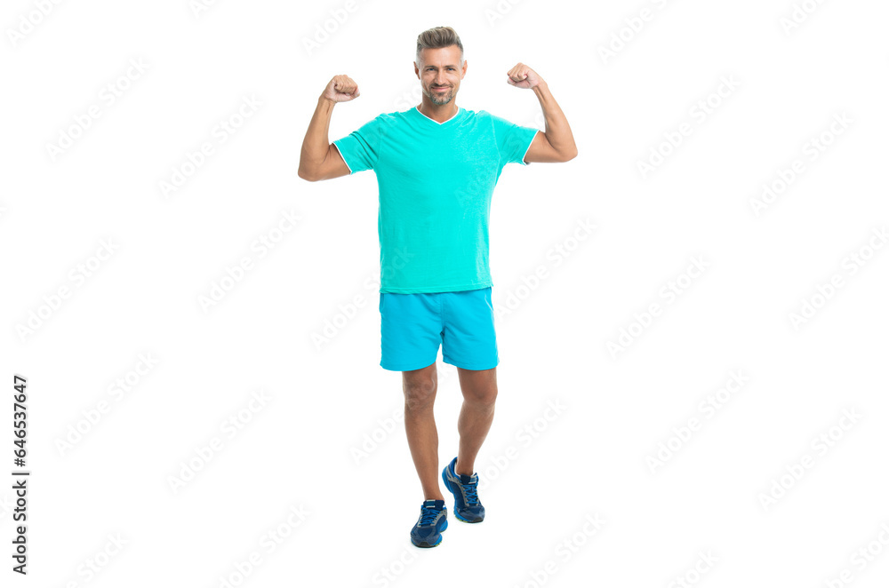 fitness working out in the gym of successful man training. full length of fitness man after exercising. fit man wearing fitness clothes isolated on white. Handsome man doing sport in fitness studio fitness working out in the gym of successful man training. full length of fitness man after exercising. fit man wearing fitness clothes isolated on white. Handsome man doing sport in fitness studio