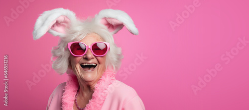Happy Mature Woman in a Bunny Suit and Sunglasses with Space for Copy