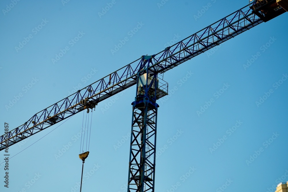 The cabin of the construction crane on the background of the sky The cabin of the construction crane on the background of the sky