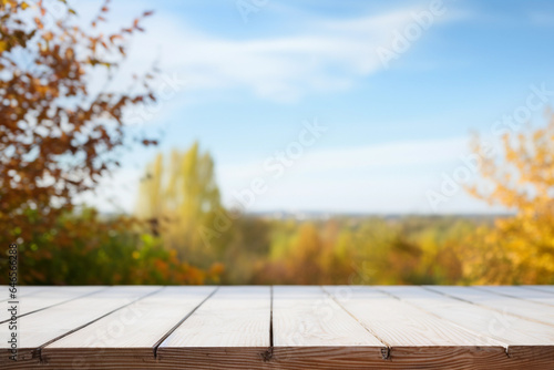 Autumn scenery with a wooden table for product display © AUDA Graphics